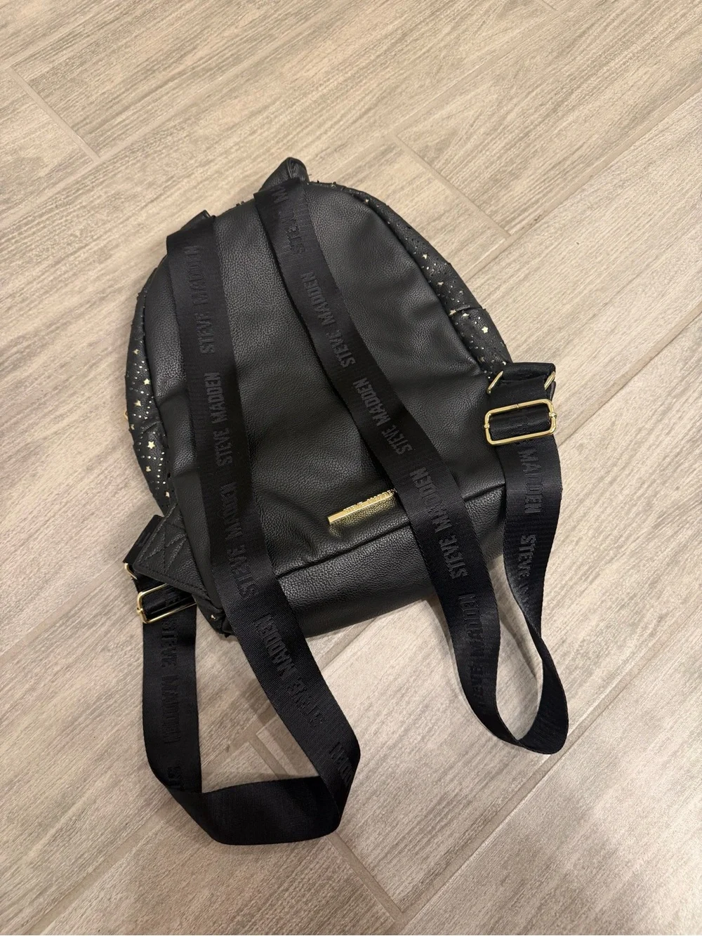Steve Madden Black Mini Backpack with Gold Star Accents